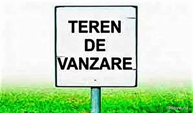 Teren intravilan 1570 mp utilitati intre case pe strada asfaltata