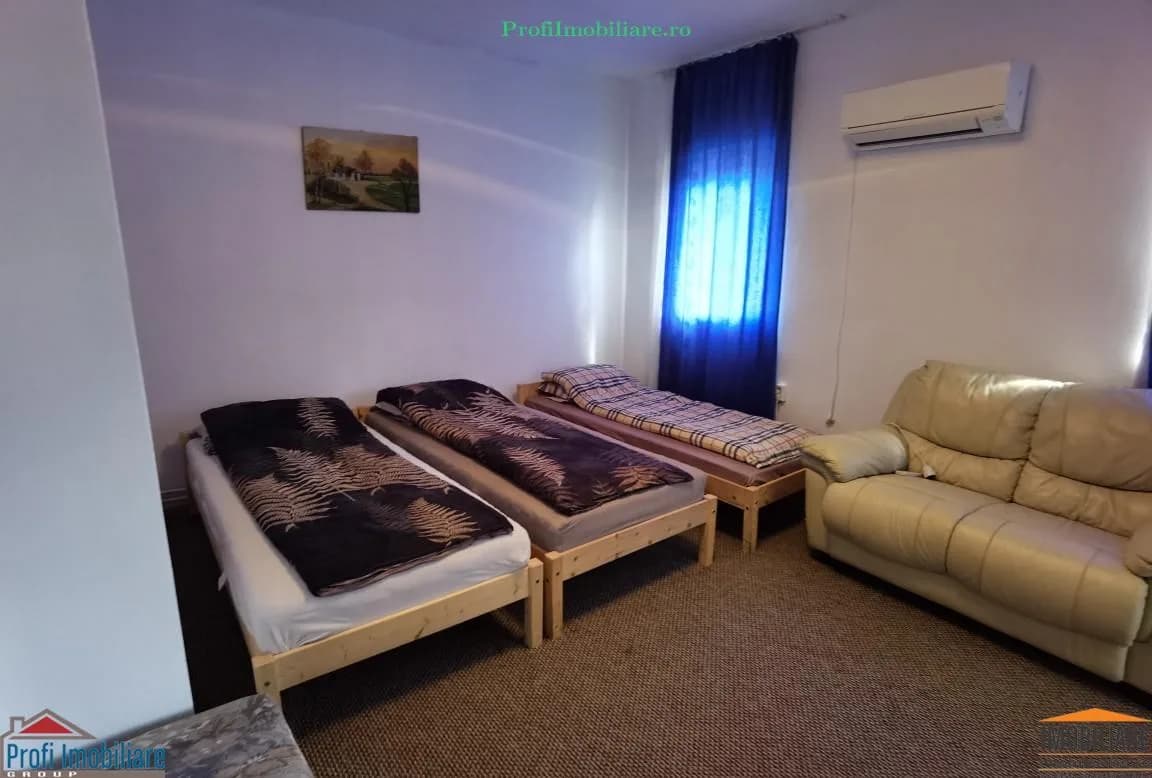 Pensiune P+1 in Paulis cu 20 de camere si teren 4.500 mp